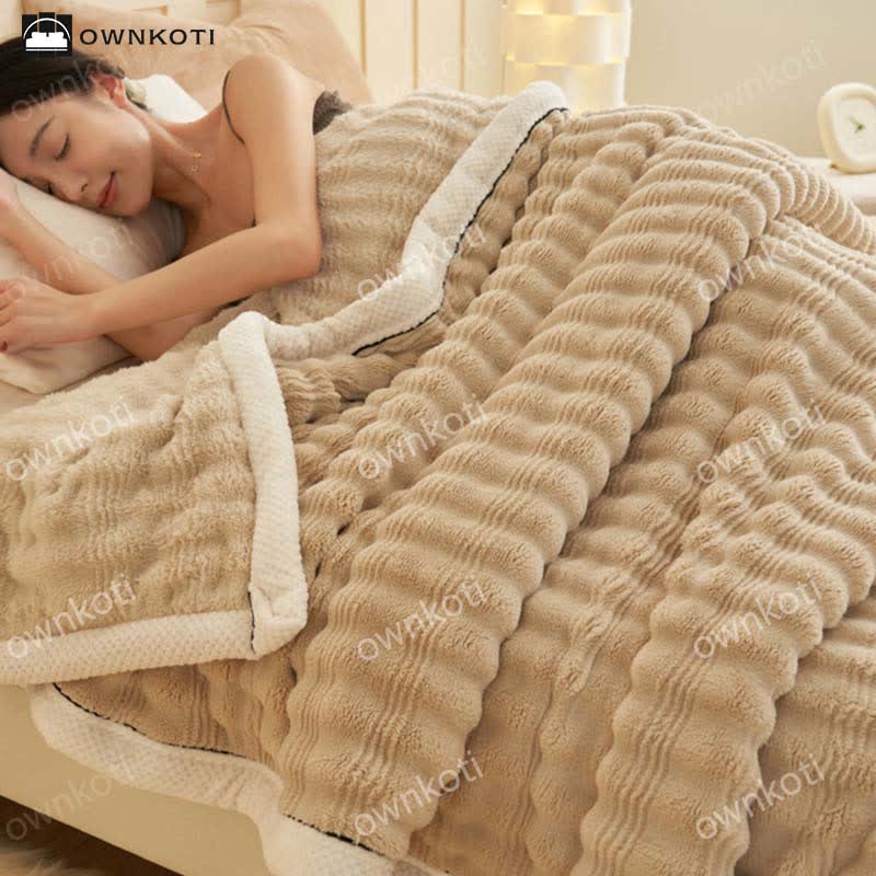 Coperta in pile con trama a onde jacquard