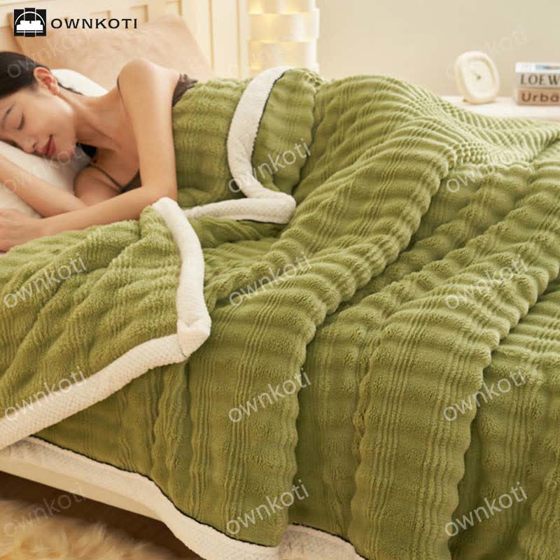 Coperta in pile con trama a onde jacquard