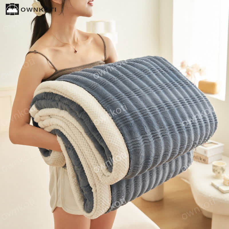 Coperta in pile con trama a onde jacquard