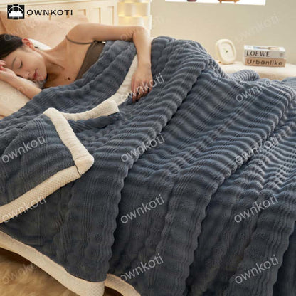 Coperta in pile con trama a onde jacquard