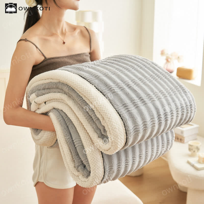 Coperta in pile con trama a onde jacquard