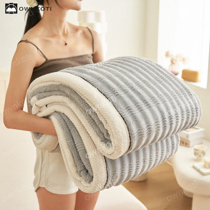 Coperta in pile con trama a onde jacquard