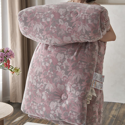 Trapunta invernale in cotone e cashmere con fiori in fiore