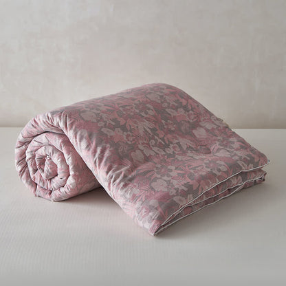 Trapunta invernale in cotone e cashmere con fiori in fiore