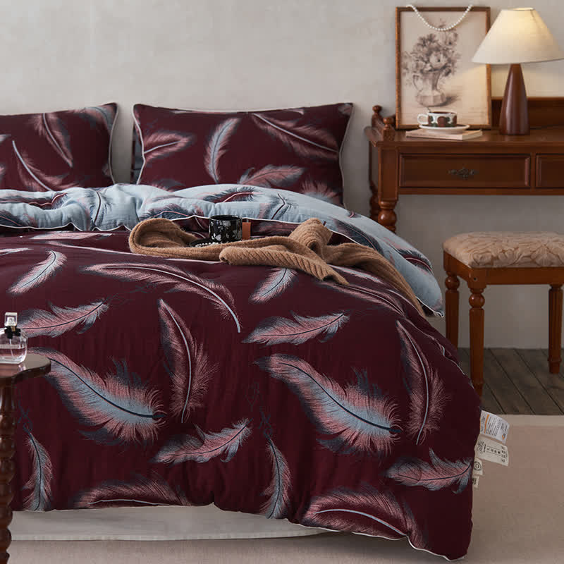 Trapunta in cotone e cashmere con piume jacquard