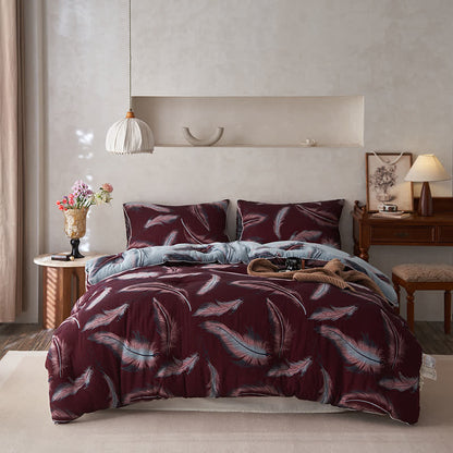 Trapunta in cotone e cashmere con piume jacquard