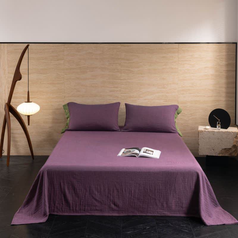 Set di biancheria da letto con bottoni in garza di cotone tinta unita (4 pezzi)