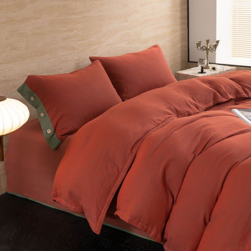 Set di biancheria da letto con bottoni in garza di cotone tinta unita (4 pezzi)