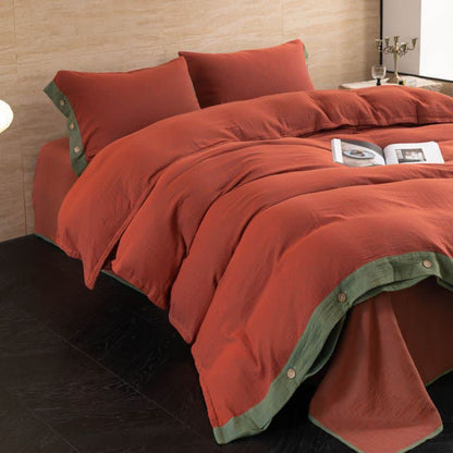 Set di biancheria da letto con bottoni in garza di cotone tinta unita (4 pezzi)