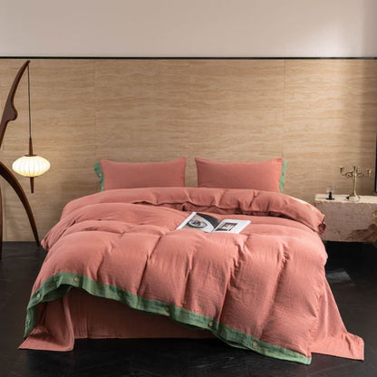 Set di biancheria da letto con bottoni in garza di cotone tinta unita (4 pezzi)