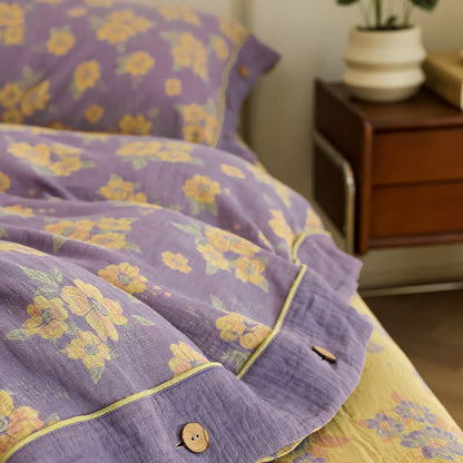 Set di biancheria da letto in garza di cotone con bottoni floreali jacquard (4 pezzi)