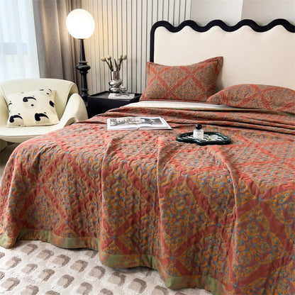 Copriletto trapuntato in cotone jacquard tinto in filo