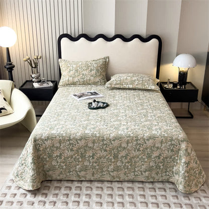 Copriletto trapuntato in garza di cotone con motivo floreale jacquard