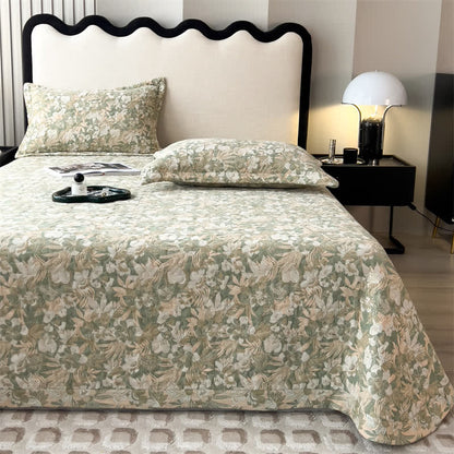 Copriletto trapuntato in garza di cotone con motivo floreale jacquard