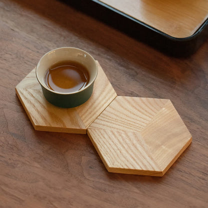 Sottobicchiere in legno a forma esagonale