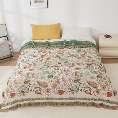Coperta in garza di cotone con motivo paisley retrò e nappa