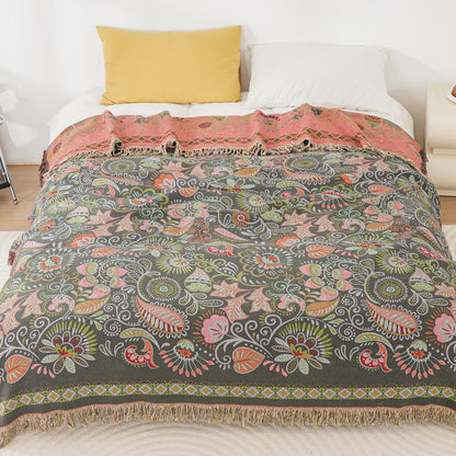 Coperta in garza di cotone con motivo paisley retrò e nappa
