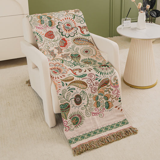 Coperta in garza di cotone con motivo paisley retrò e nappa