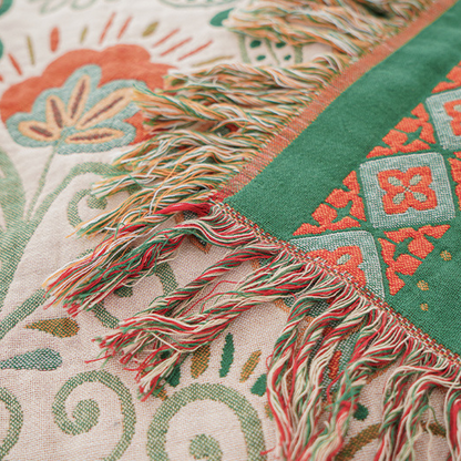 Coperta in garza di cotone con motivo paisley retrò e nappa