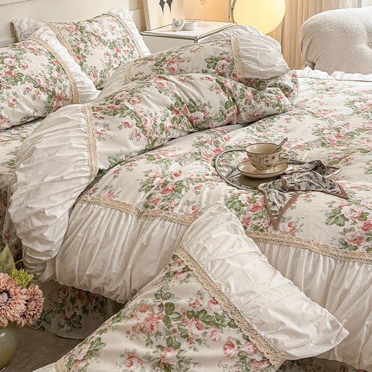 Elegante set di biancheria da letto con gonna floreale (4 pezzi)