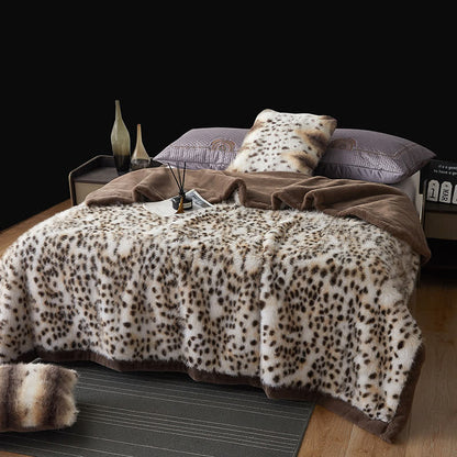 Coperta in pelliccia sintetica con motivo leopardo delle nevi