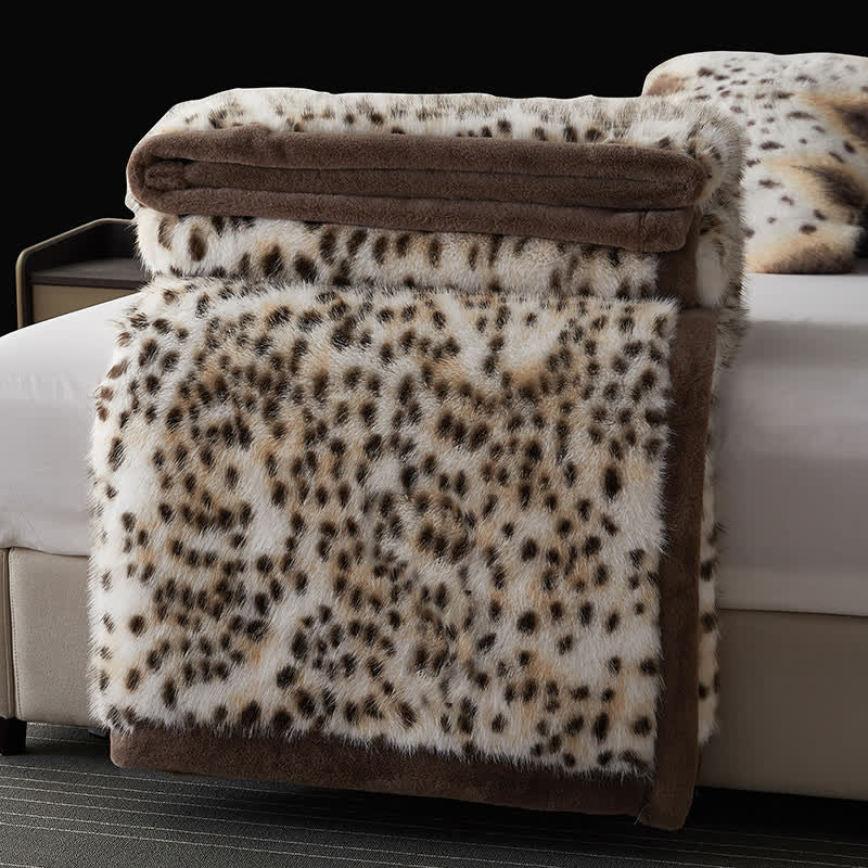 Coperta in pelliccia sintetica con motivo leopardo delle nevi