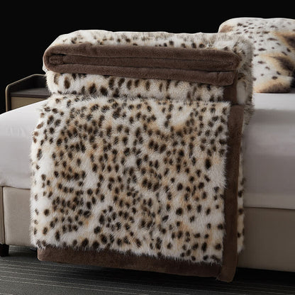 Coperta in pelliccia sintetica con motivo leopardo delle nevi