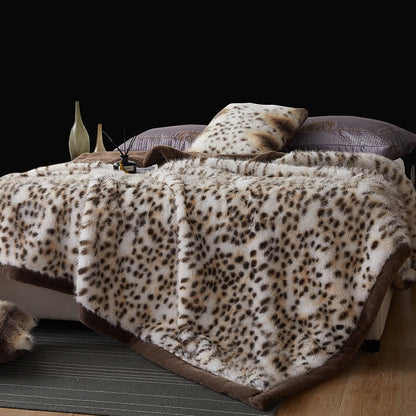 Coperta in pelliccia sintetica con motivo leopardo delle nevi