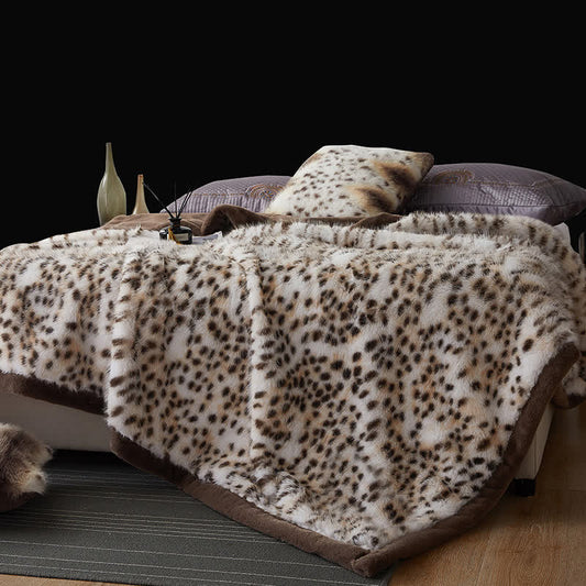 Coperta in pelliccia sintetica con motivo leopardo delle nevi