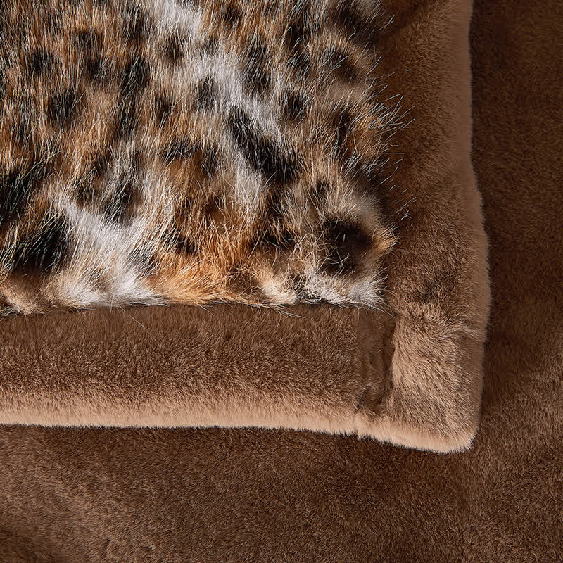 Coperta in pelliccia sintetica con motivo leopardo delle nevi