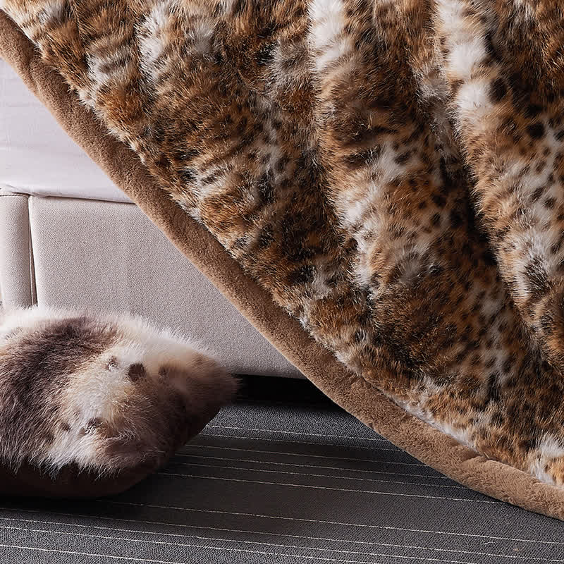 Coperta in pelliccia sintetica con motivo leopardo delle nevi