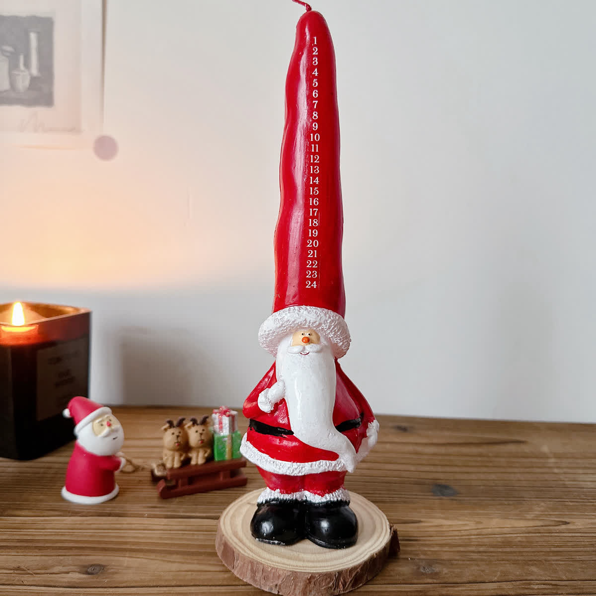 Decorazione regalo con candela a forma di numeri di Babbo Natale