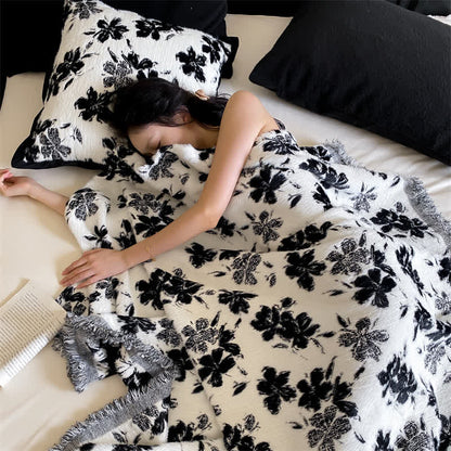 Coperta morbida con fiori d'arancio