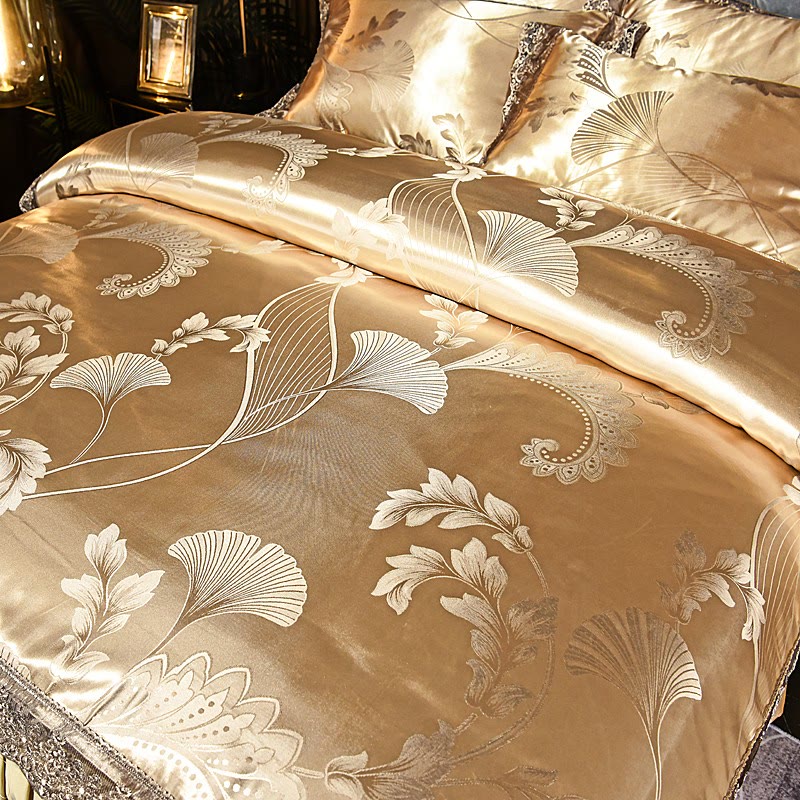 Set di biancheria da letto con gonna in raso e foglie di ginkgo (4 pezzi)