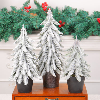 Decorazione per la casa in vaso con albero di Natale innevato