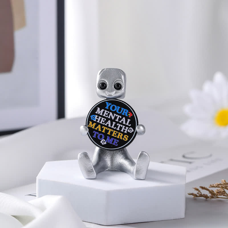 Piccola statua in resina di robot con slogan