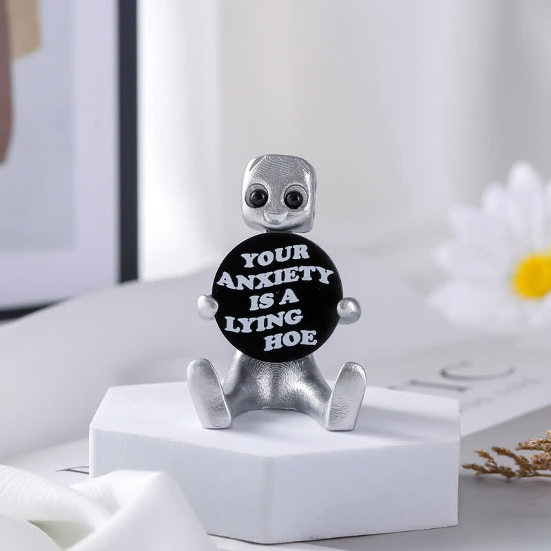 Piccola statua in resina di robot con slogan