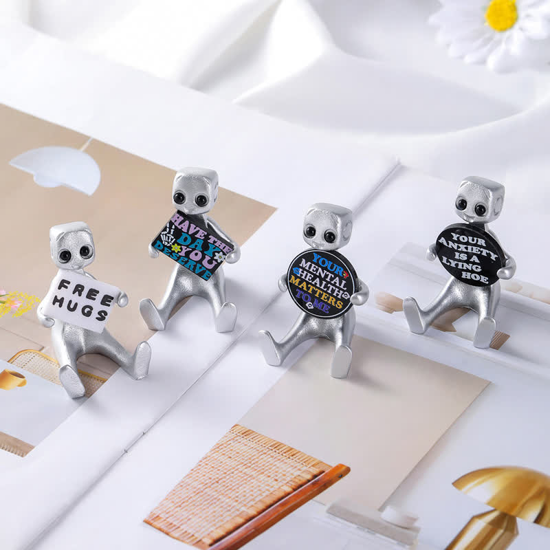 Piccola statua in resina di robot con slogan