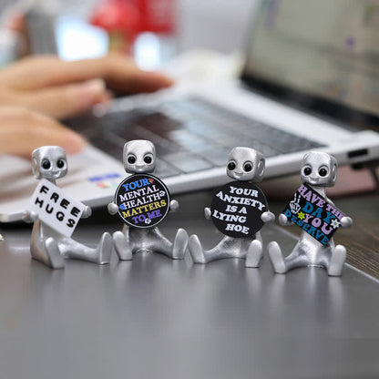 Piccola statua in resina di robot con slogan
