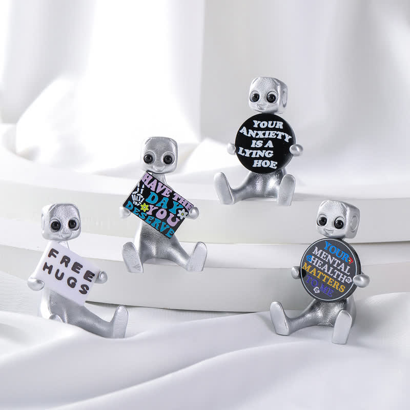 Piccola statua in resina di robot con slogan