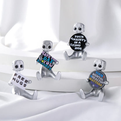 Piccola statua in resina di robot con slogan
