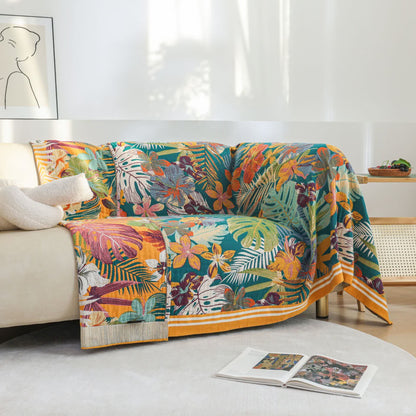 Coperta in garza di cotone con motivo a fiori e foglie vivaci