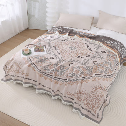 Coperta in garza di cotone leggera con motivo Paisley e nappa