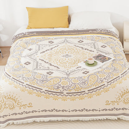 Coperta in garza di cotone leggera con motivo Paisley e nappa