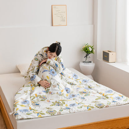 Trapunta portatile floreale con maniche