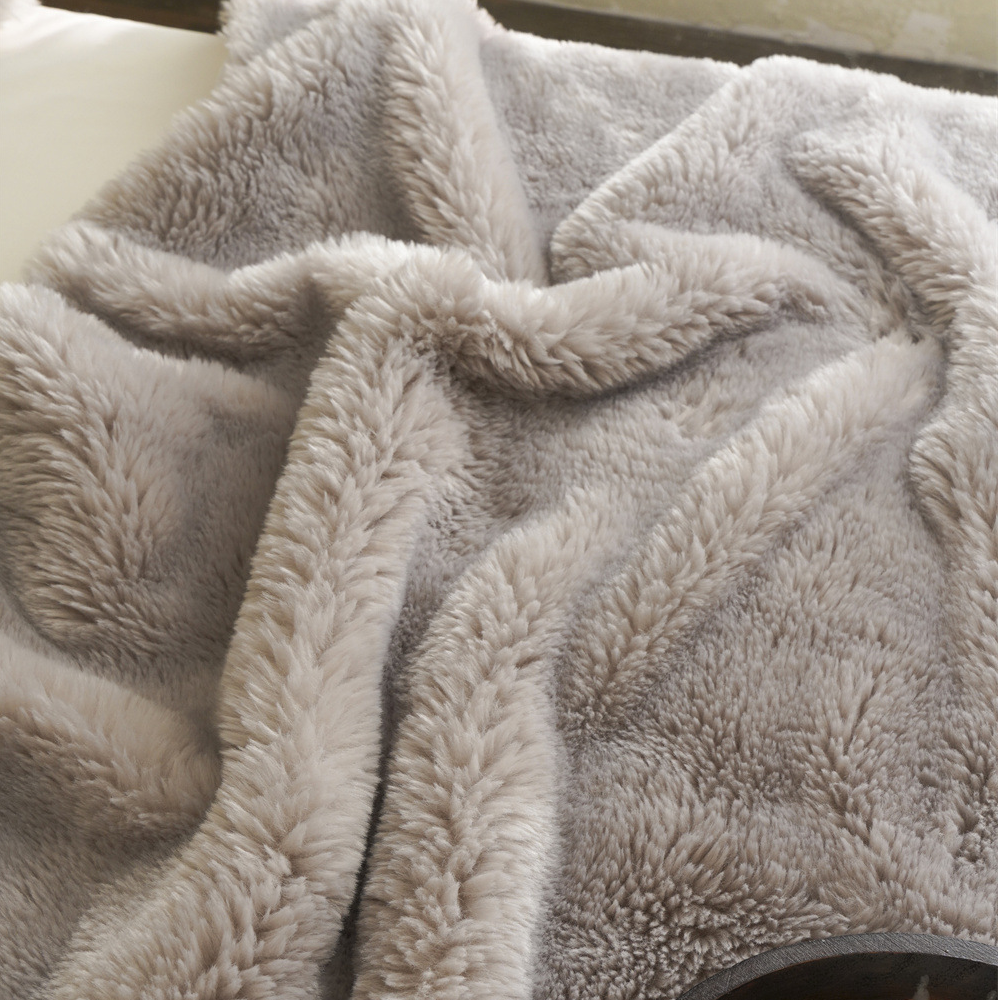 Coperta in pile bifacciale tinta unita