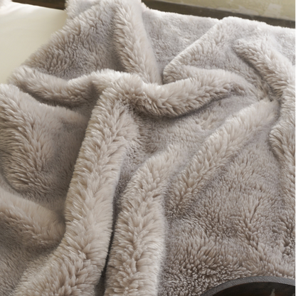 Coperta in pile bifacciale tinta unita
