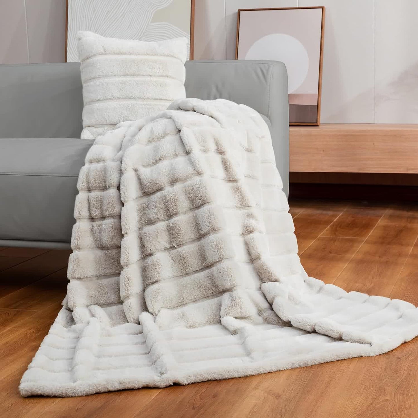 Coperta a righe in peluche tinta unita