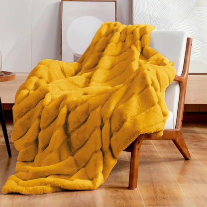 Coperta a righe in peluche tinta unita