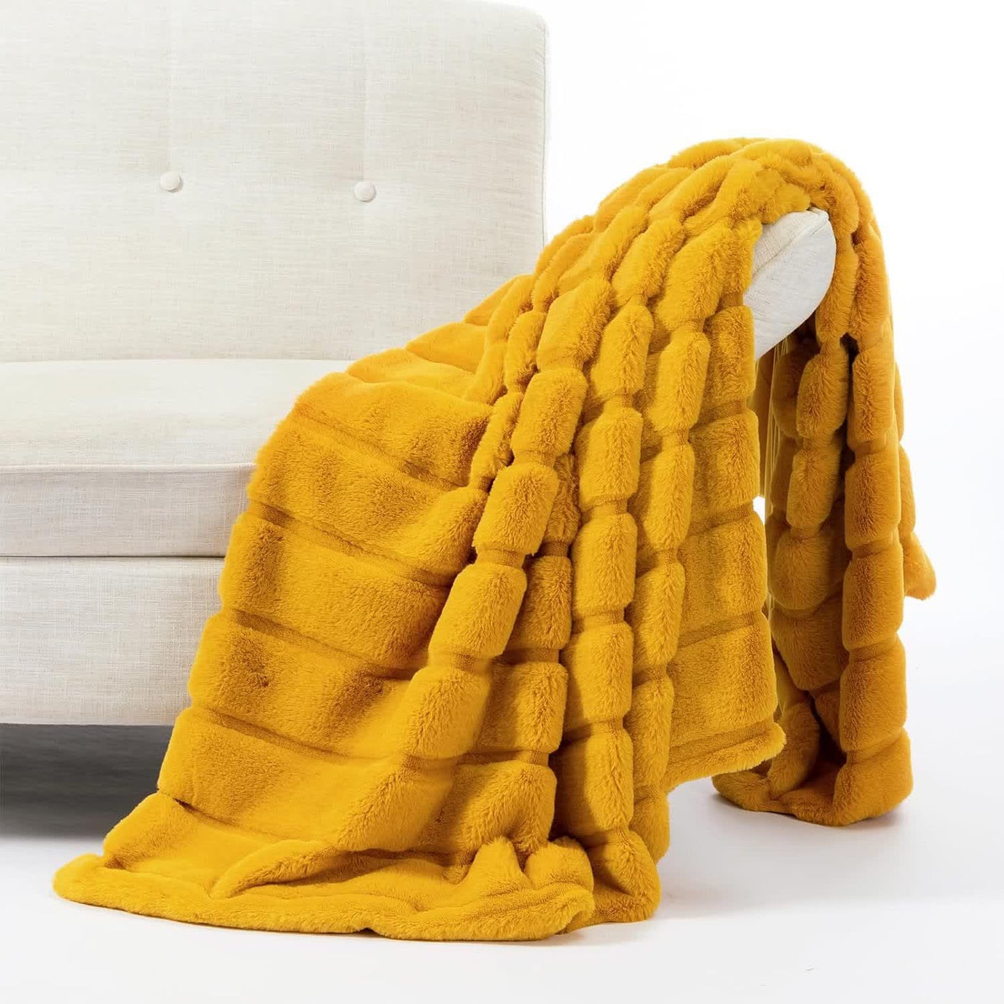 Coperta a righe in peluche tinta unita